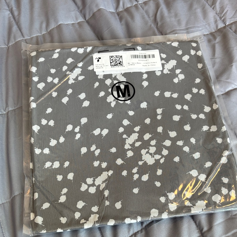 Gray and White Patterned Fabric